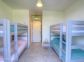 G&icirc;te &agrave; Porto Vecchio, le Sud Corse, labellis&eacute; G&icirc;tes de France : la chambre avec les lits superpos&eacute;s