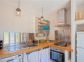 Gîte A Casa Bianca - Location de vacances à Pigna en Corse, Gîtes de France : la cuisine d'été en rez-de-jardin Gîte A Casa Bianca - Location de vacances à Pigna en Corse, Gîtes de France : la cuisine d'été en rez-de-jardin