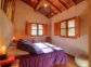 Gite &agrave; Levie, Corse du Sud, labelis&eacute; G&icirc;tes de France : une chambre avec un lit double