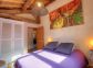 Gite &agrave; Levie, Corse du Sud, labelis&eacute; G&icirc;tes de France : une chambre avec un lit double